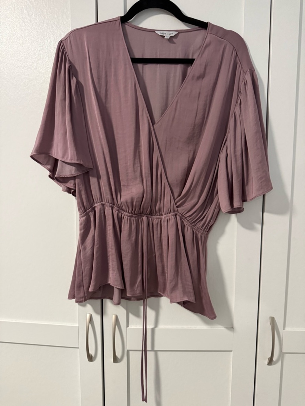 Naked Zebra mauve wrap peplum blouse with flutter sleeves